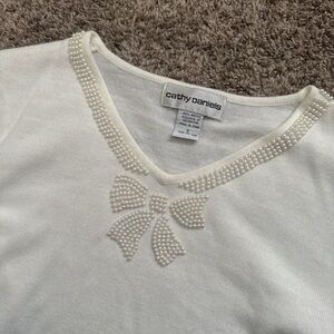 Pearled bow holiday sweater